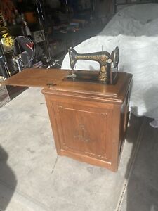 Singer Treadle Sewing Machine Model Class 66 In Cabinet