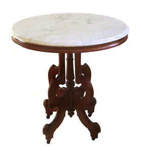 A Victorian Marble Top Table Oval Top Walnut Base
