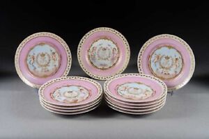 Twelve Antique Sevres Style Pink Ground Porcelain Plates Circa 1850