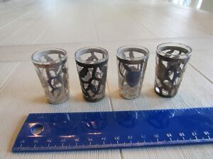 Four Sterling Silver Shot Glasses