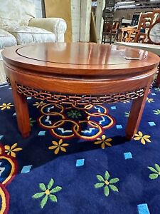 Vintage Chinese Hardwood Round Coffee Table With Hand Carved Details