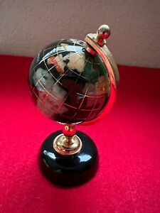Small 4 World Globe On A Rotating Axis With Inlaid Look Gold Lines Works 