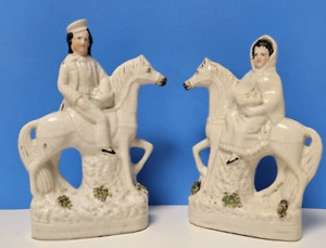 Staffordshire Pair Of Horse Figurines With Man Women Rider With Fruit Baskets