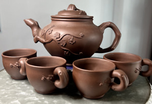 Chinese Yixing Zisha Clay Pottery Tea Set Teapot 4 Tea Cups Plum Blossom