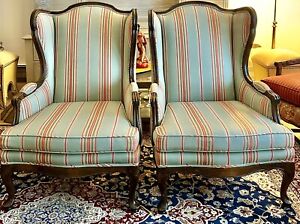 A Pair Of French Country Style Striped Upholstered Wood Framed Wingback Chairs