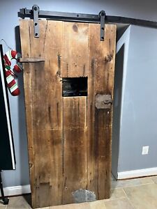 Rustic Antique Barn Door With Rollers Attached Over 100 Years Old