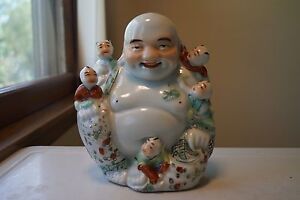 A Chinese Famille Rose Porcelain Sitting Buddha Boys Mao Jisheng