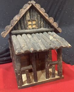 Primitive Twig And Wood Style Log Cabin With Porch