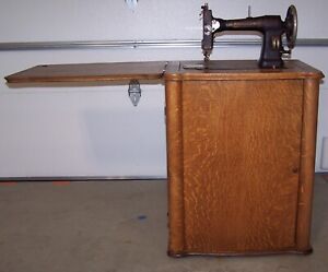 1917 White Family Treadle Sewing Machine In A Tiger Oak Parlor Cabinet