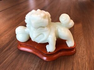 Chinese Carved Light Green Jade Foo Dog On Wooden Stand