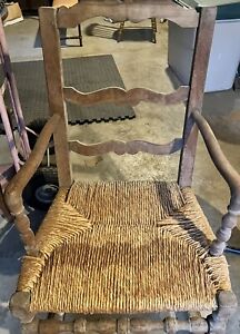 Antique Carved Primitive Reed Or Cane Seat Rocking Chair