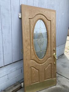 Solid Wooden Door Paired With Gold Handles Good Condition No Visible Scratches