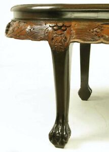Chinese Oval Coffee Table With Hand Carved Battle Scene And Six Stools