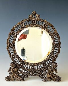 Antique Round Cast Iron Beveled Mirror Frame Easel Back Cupid Cherub Putto