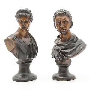 A Pair Of Grecian Inspired Metal Figural Busts