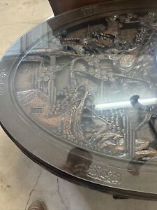 Chinese Oval Coffee Table With Hand Carved Battle Scene And Six Stools